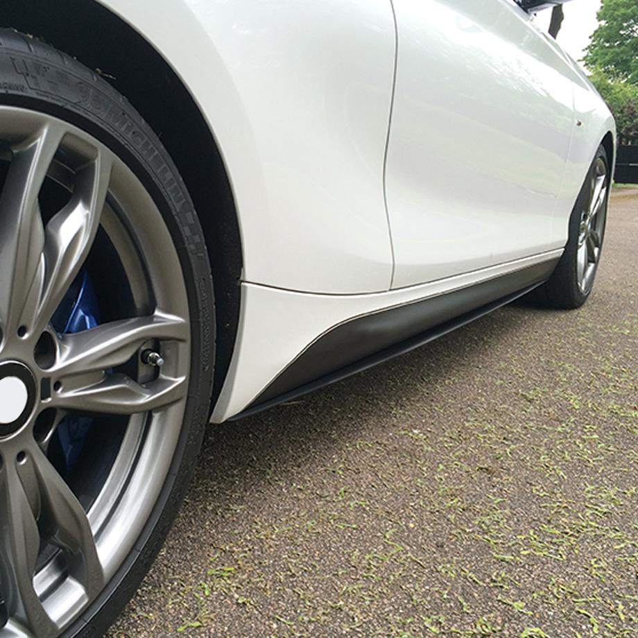 BM F20 1-Series Gloss Plastic Black Side Skirts maxmotorsports