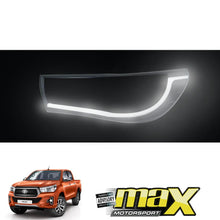Load image into Gallery viewer, Toyota Hilux Revo Dakar DRL LED Headlight Surrounds (2018-On) maxmotorsports
